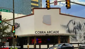 arcade on the corner in a city's downtown