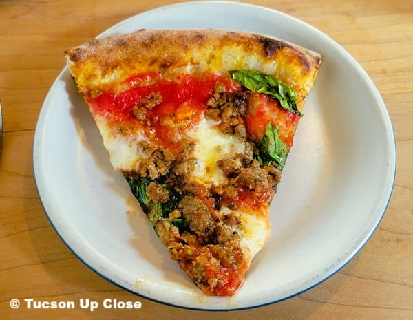 slice of pizza on a plate