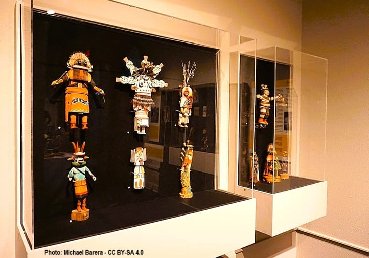 Display of Hopi katsina dolls in a museum