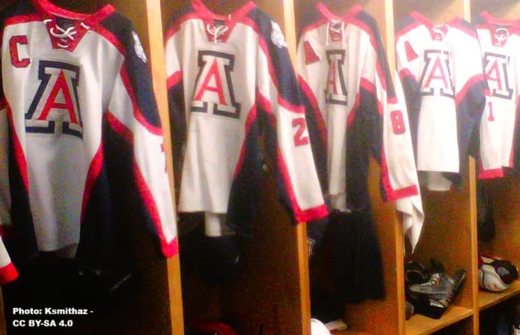 University of Arizona hockey team uniforms handing in the locker room. University of Arizona hockey team uniforms handing in the locker room.