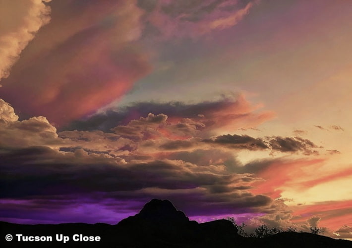 Vivid sunset over mountains after a thunderstorm