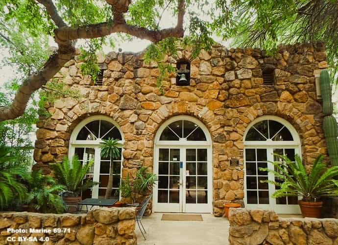 Historic building in an arboretum park.