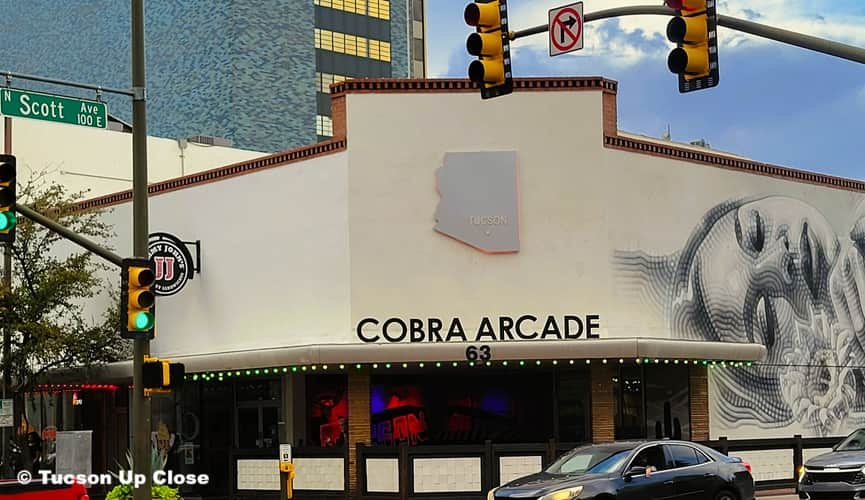 arcade on the corner in a city's downtown