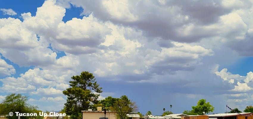 Monsoon cloud build-up with rain in the distance