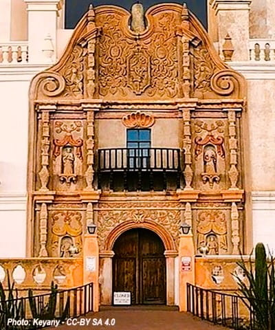 Mission entryway with its introduction to the carvings seen even more inside.