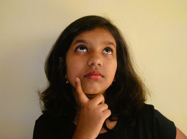 young woman looking puzzled when wondering about something