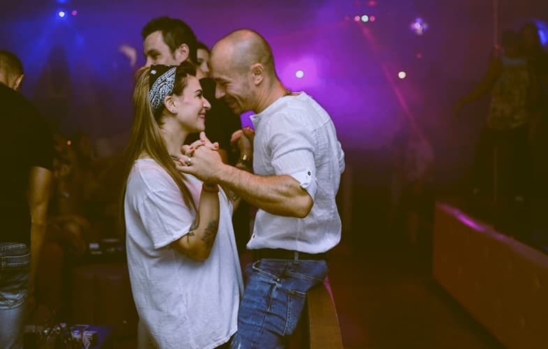 couple dancing at a night club