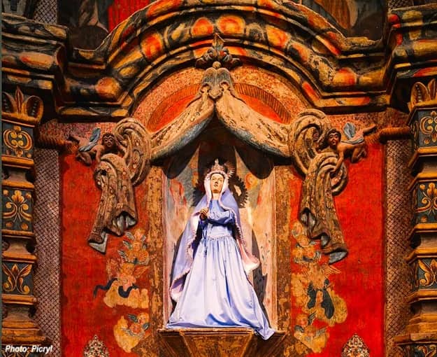 Saint in an alcove of the Mission in Tucson