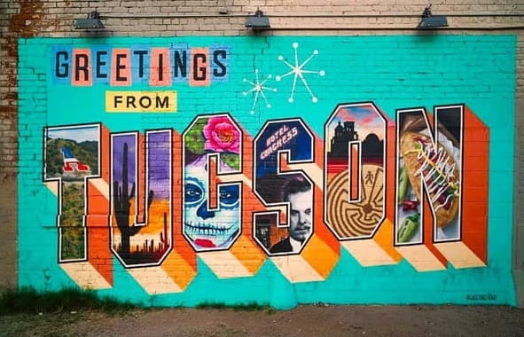 wall in Tucson Arizona painted with a colorful welcome greeting